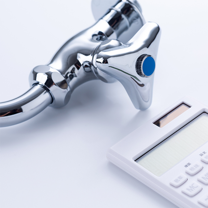 水道の蛇口と電卓
